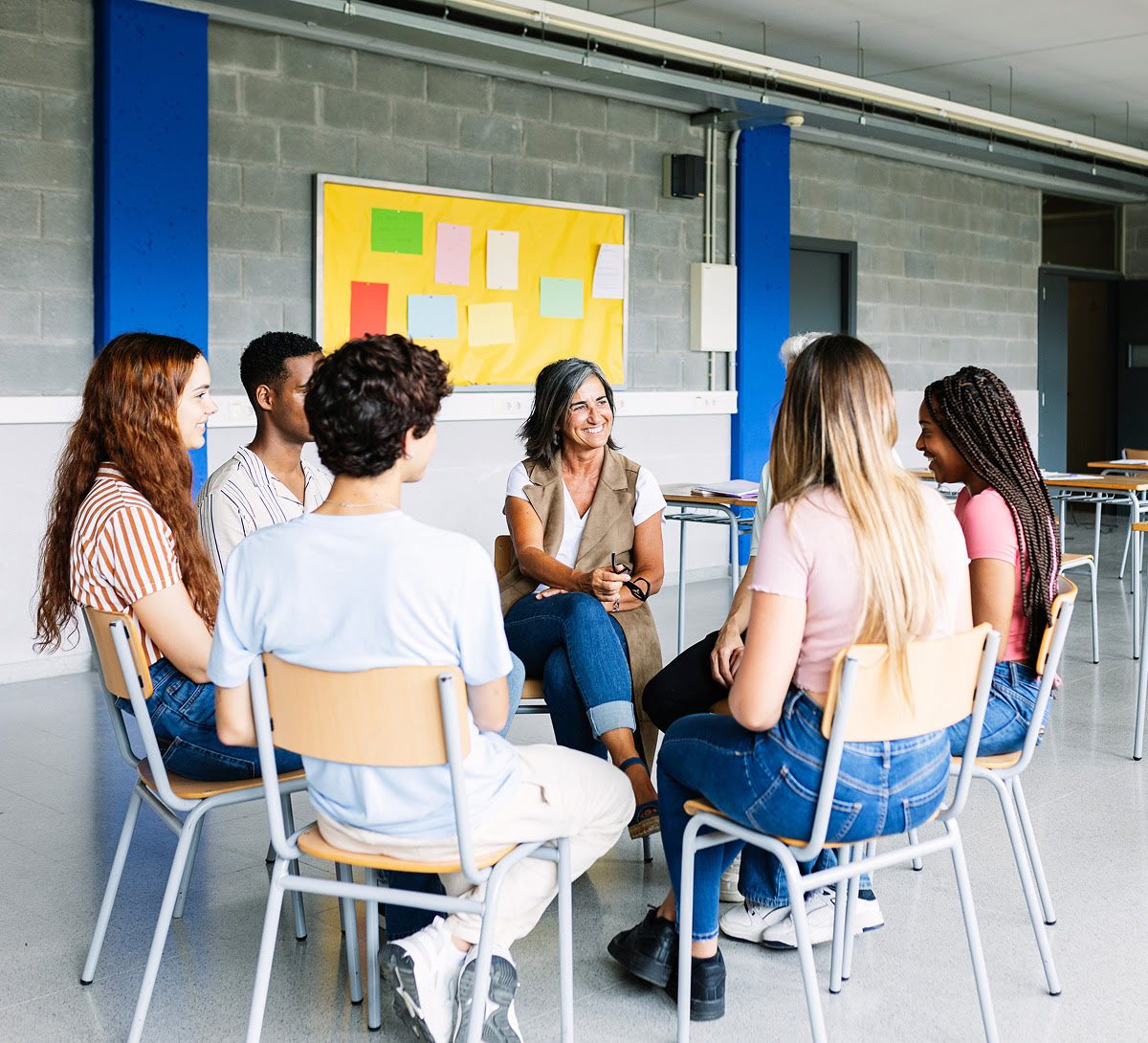 Classroom group discussion with teacher